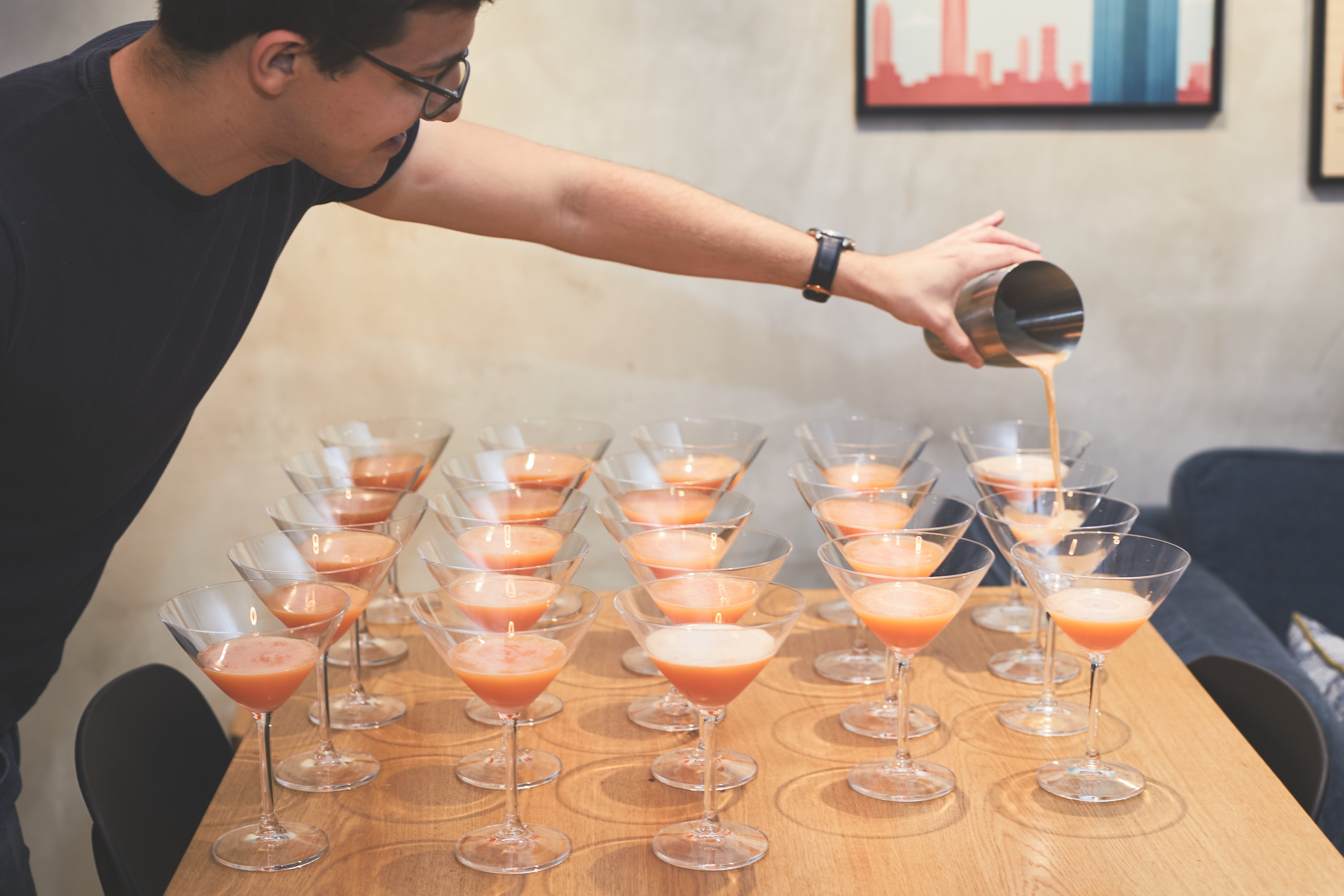 A man pouring drinks